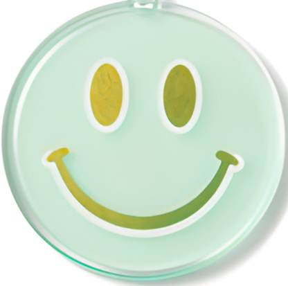 Round green container with a smiley face design on a white background