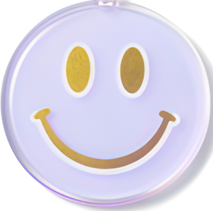 Round purple container with a smiley face design on a white background